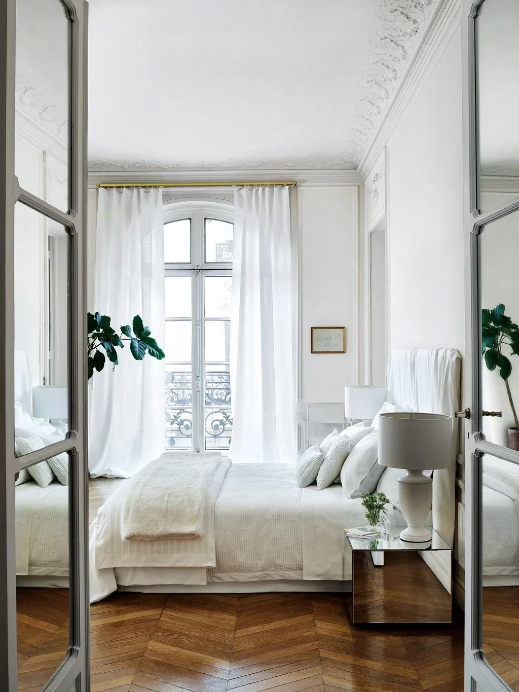 parisian-bedroom-with-classic-white-linens-via-zara-home.webp